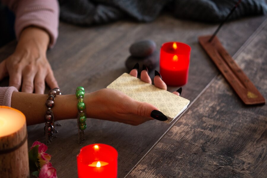 fortune-teller-reading-future-by-tarot-cards-rustic-table_123827-19378