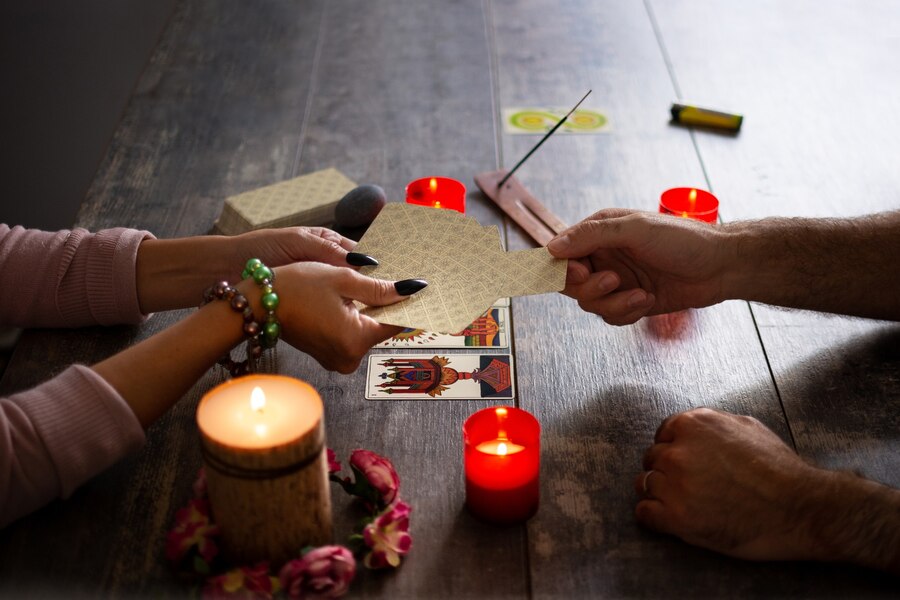 fortune-teller-reading-future-by-tarot-cards-rustic-table_123827-19488